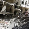 Cảnh đổ nát sau vụ không kích tại thủ đô Sanaa ngày 22/9. (Nguồn: Reuters/TTXVN)