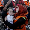 Người di cư tại đảo Lesbos của Hy Lạp sau khi được cứu vớt ngày 19/9. (Nguồn: Reuters/TTXVN)