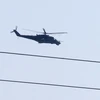 Máy bay trực thăng của Nga bay qua sân bay quốc tế Latakia ngày 24/9. (Nguồn: AFP/TTXVN)