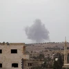 Khói bốc lên sau một cuộc không kích tại Idlib, Syria ngày 1/10. (Nguồn: Reuters/TTXVN)