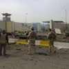 Một loạt vụ đánh bom và tấn công đã xảy ra cùng một lúc gần các văn phòng công quyền của Irag sát khu vực Vùng Xanh ở thủ đô Baghdad năm 2013. (Nguồn: AFP/TTXVN)