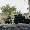 Cảnh sát Thổ Nhĩ Kỳ tuần tra tại khu vực quận Silvan ở Diyarbakir sau cuộc đụng độ với phiến quân người Kurd, ngày 5/10. (Nguồn: AFP/TTXVN)