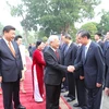 Tổng Bí thư, Chủ tịch nước Trung Quốc Tập Cận Bình giới thiệu với Tổng Bí thư Nguyễn Phú Trọng các thành viên đoàn Trung Quốc. (Ảnh: Trí Dũng/TTXVN)
