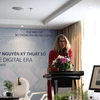 Bà Jill Grinda, Phụ trách Kinh doanh khu vực châu Á của Reuters trong bài phát biểu mở đầu hội thảo (Ảnh: Doãn Đức/VietnamPlus)