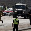 Lực lượng an ninh Israel làm nhiệm vụt tại hiện trường vụ tấn công ở giao lộ Tapuah, Nablus, Bờ Tây ngày 8/11. (Nguồn: AFP/TTXVN)