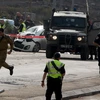 Lực lượng an ninh Israel làm nhiệm vụt tại hiện trường vụ tấn công ở giao lộ Tapuah, Nablus, Bờ Tây ngày 8/11. (Nguồn: AFP/TTXVN)
