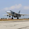 Máy bay chiến đấu Sukhoi Su-24 của Nga cất cánh từ căn cứ không quân Hmeimim ở tỉnh Latakia, Syria ngày 3/10. (Nguồn: AFP/TTXVN)