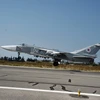 Máy bay chiến đấu Sukhoi Su-24M của Nga cất cánh từ sân bay quân sự Hmeymim, gần thành phố Latakia ngày 21/10. (Nguồn: THX/TTXVN)