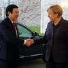 Chủ tịch nước Trương Tấn Sang gặp Thủ tướng Cộng hòa Liên bang Đức Angela Merkel. (Ảnh: Nguyễn Khang/TTXVN)