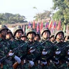 Khối Lục quân Lào đang phô diễn sức mạnh. (Ảnh: Phạm Kiên/Vietnam+)