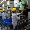 Sản xuất các linh kiện kim loại, cơ khí… tại Công ty Cơ khí Chính xác Việt Nam 1, 100% vốn đầu tư của Đài Loan. (Ảnh: Danh Lam/TTXVN)
