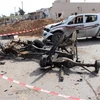 Hiện trường một vụ đánh bom ở Msillata, gần thành phố Khoms, Libya. (Nguồn: THX/TTXVN)