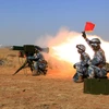 Các binh sỹ Trung Quốc trong cuộc tập trận ngày 15/3. (Nguồn: THX/TTXVN)