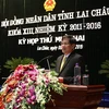 Chủ tịch UBND tỉnh Đỗ Ngọc An trình bày báo cáo tại kỳ họp. (Nguồn: Laichau.gov.vn)