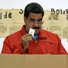 Tổng thống Venezuela Nicolás Maduro bỏ phiếu tại điểm bầu cử ở Caracas ngày 6/12. (Nguồn: AFP/TTXVN)