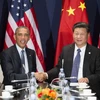 Tổng thống Mỹ Barack Obama (trái) và Chủ tịch Trung Quốc Tập Cận Bình trong cuộc hội đàm bên lề Hội nghị COP 21. (Nguồn: THX/TTXVN)