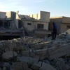 Một tòa nhà bị phá hủy trong cuộc không kích IS ở thành phố Fallujah ngày 9/12. (Nguồn: THX/TTXVN)