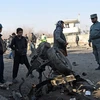 Nhân viên an ninh điều tra tại hiện trường một vụ tấn công tại Afghanistan. (Nguồn: AFP/TTXVN)
