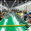 Dây chuyền sản xuất, lắp ráp thiết bị điện tử tại Công ty TNHH Hanmi Flexible Vina (100% vốn đầu tư Hàn Quốc) tại khu Công nghiệp Tràng Duệ. (Ảnh: Danh Lam/TTXVN)