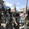 Các tay súng phong trào Hamas tại Deirl al-Balah thuộc Dải Gaza ngày 10/10 vừa qua. (Ảnh: Reuters/TTXVN)