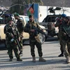 Lực lượng an ninh Afghanistan phong tỏa hiện trường vụ tấn công. (Nguồn: AFP/TTXVN)