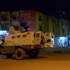Lực lượng an ninh được triển khai bên ngoài khách sạn Splendid ngày 15/1. (Nguồn: AFP/TTXVN)