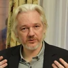 Nhà sáng lập WikiLeaks Julian Assange trong cuộc họp báo tại Đại sứ quán Ecuador ở London, Anh ngày 18/8/2014. (Nguồn: Reuters/TTXVN)
