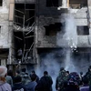Hiện trường vụ đánh bom kép tại Syria. (Nguồn: AFP/TTXVN)