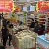 Khách hàng mua sắm tại siêu thị CoopMart Đông Hà, Quảng Trị. (Ảnh: Vũ Sinh/TTXVN)