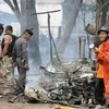 Cảnh sát Thái Lan điều tra tại hiện trường vụ nổ ở Pattani. (Nguồn: AFP/TTXVN)