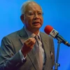 Thủ tướng Malaysia Najib Razak phát biểu trong cuộc họp báo về dự thảo ngân sách tại Kuala Lumpur ngày 28/1. (Nguồn: AFP/TTXVN)