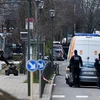 Cảnh sát Bỉ làm nhiệm vụ trong cuộc bố ráp ở Schaerbeek, Brussels ngày 25/3. (Nguồn: AFP/TTXVN)