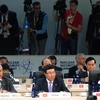  Phó Thủ tướng, Bộ trưởng Ngoại giao Phạm Bình Minh (ngồi giữa) tại phiên họp toàn thể của hội nghị. (Ảnh: Thanh Tuấn/TTXVN)