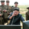 Nhà lãnh đạo Triều Tiên Kim Jong-un chỉ đạo một cuộc phóng thử tên lửa đạn đạo. (Nguồn: Reuters/TTXVN)