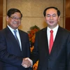 Chủ tịch nước Trần Đại Quang tiếp Phó Thủ tướng, Bộ trưởng Bộ Nội vụ Vương quốc Campuchia Samdech Krolahom Sar Kheng. (Ảnh: Nhan Sáng/TTXVN)