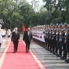 Tổng Bí thư Nguyễn Phú Trọng và Tổng Bí thư , Chủ tịch nước Lào Bounnhang Volachith duyệt đội danh dự Quân đội nhân dân Việt Nam. (Ảnh: Trí Dũng/TTXVN)