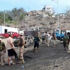 Lực lượng an ninh Yemen điều tra tại hiện trường một vụ đánh bom. (Nguồn: AFP/TTXVN)