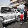 Hiện trường vụ đánh bom xe ở Sadr City, Baghdad, Iraq ngày 11/5. (Nguồn: AFP/TTXVN)