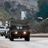 Đoàn xe của Lực lượng giữ gìn hòa bình LHQ và quân đội Liban thị sát thị trấn Marjayoun ở khu vực biên giới giữa Liban với Israel sau vụ nã pháo trả đũa của Israel. (Nguồn: AFP/TTXVN)