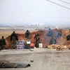 Binh sĩ Syria gác tại các chốt ở làng Ain al-Beida, ngoại ô Al-Bab, tỉnh Aleppo ngày 13/1. (Nguồn: AFP/TTXVN)
