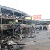 Hiện trường vụ tai nạn giao thông khiến 12 người chết tại Bình Thuận (Ảnh: Nguyễn Thanh/TTXVN)