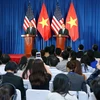 Chủ tịch nước Trần Đại Quang (bên phải) và Tổng thống Barack Obama tại cuộc họp báo. (Ảnh: Nhan Sáng/TTXVN)