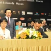 Cục trưởng Cục Du lịch Macau, bà Văn Kỳ Hoa và đối tác ký thỏa thuận hợp tác tổ chức IFAM lần thứ nhất. (Ảnh: Xuân Tuấn/Vietnam+)
