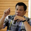 Tổng thống Rodrigo Duterte phát biểu trong cuộc họp báo đầu tiên sau khi ông tuyên bố đắc cử Tổng thống, tại thành phố Davao, đảo Mindanao, miền Nam Philippines ngày 16/5. (Nguồn: EPA/TTXVN)
