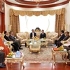 Bí thư Thành ủy TP.HCM đến thăm và chúc sức khỏe các vị nguyên Lãnh đạo Đảng và Nhà nước Lào. (Ảnh: Phạm Kiên/Vietnam+)