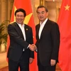 Phó Thủ tướng, Bộ trưởng Ngoại giao Phạm Bình Minh hội kiến với Bộ trưởng Ngoại giao Trung Quốc Vương Nghị. (Ảnh: Hải Yến/TTXVN)