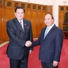 Thủ tướng Nguyễn Xuân Phúc tiếp Phó Thủ tướng Vương quốc Thái Lan Thanasak Patimaprakorn. (Ảnh: Thống Nhất/TTXVN)