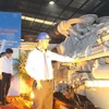 Tổ hợp máy phát hiện “khủng” SBMPOWER công suất 8.600 KVA đang trên đường đến Campuchia. (Ảnh: Chí Tưởng/Vietnam+)