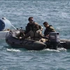 Các chuyên gia về bom mìn của Hải quân Pháp thực hiện nhiệm vụ phá thiết bị nổ trong cuộc tập trận tại Port-Vendres (Pháp) ngày 23/5. (Nguồn: AFP/TTXVN)