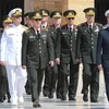 Thủ tướng Thổ Nhĩ Kỳ Binali Yildirim (phải, phía trước) và Tổng Tư lệnh lực lượng vũ trang Hulusi Akar (trái, phía trước) cùng các thành viên YAS trước phiên họp ở Ankara ngày 28/7. (Nguồn: AFP/TTXVN)